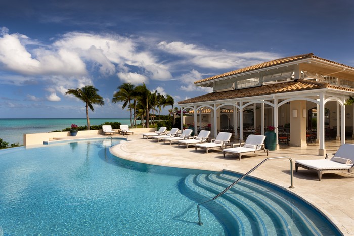 Sun Loungers by the Pool at Jumby Bay