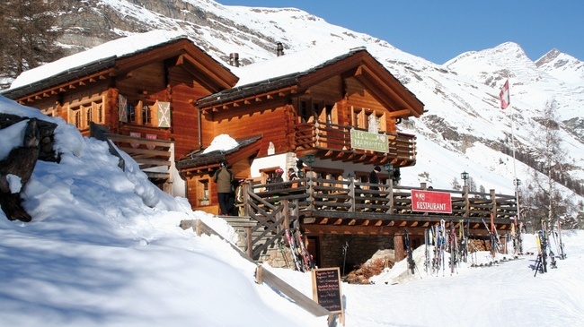Les Marmottes restaurant sits comfortably in the Alpine snow