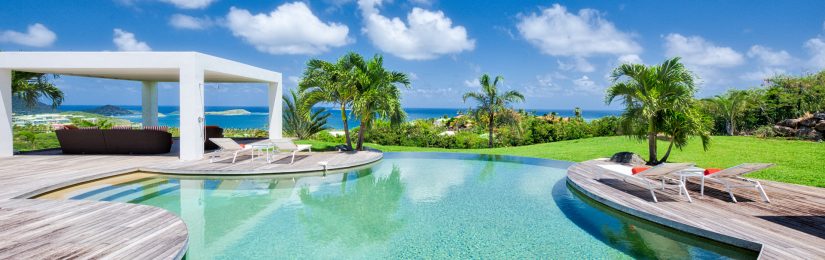 Pool, shade, and sundeck at a beach front villa in St Martin