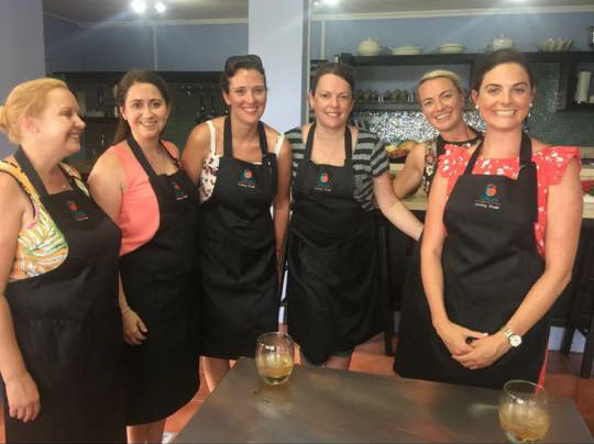 A fresh group prepare for instruction at the Spice Cooking Studio in St Lucia