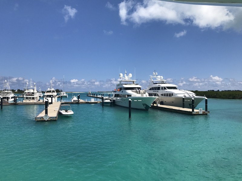 Blue Haven Marina at Turks and Caicos A number of sleek white yachts and smaller skiffs berthed at the Blue Haven Marina