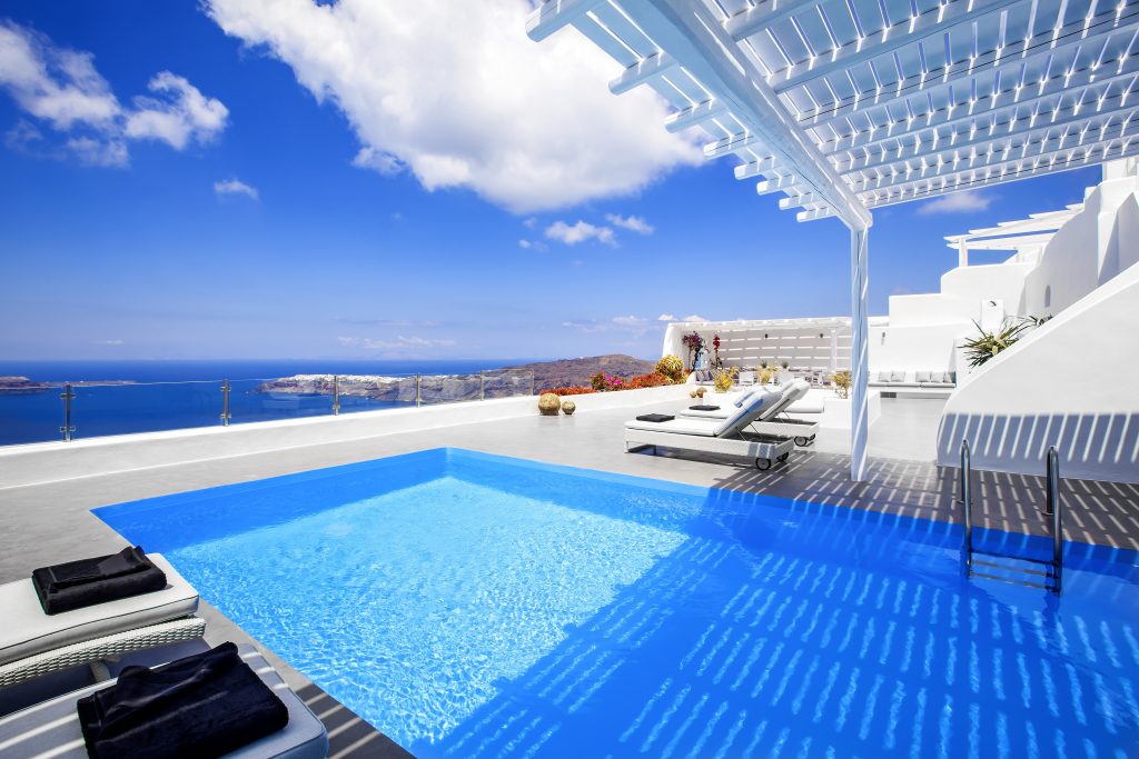The sun deck at Erossea Villa in Santorini. Lots of blue. Lots of white. Lots of cool.