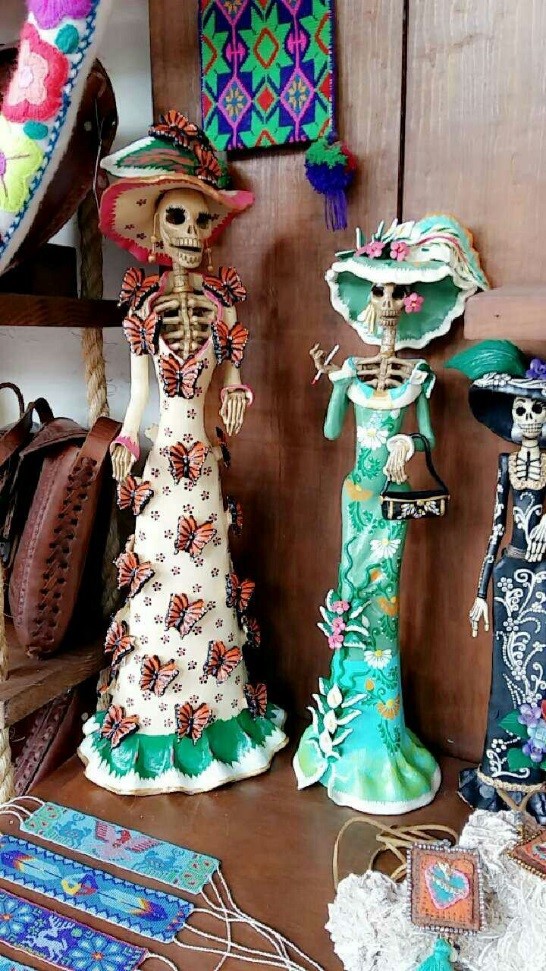Stylish skeletons at Sayulita traditional Handmade skull dolls at Sayulita