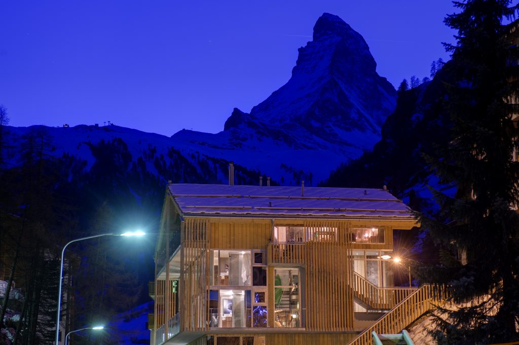 Backstage Loft Backstage Loft set against the purple-blue of dusk in Zermatt