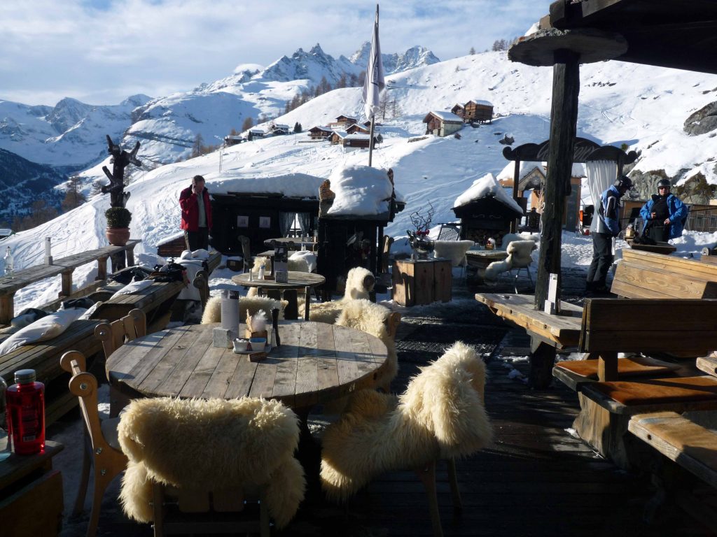 Chez Vrony's outdoor dining area, complete with fur-lined chairs