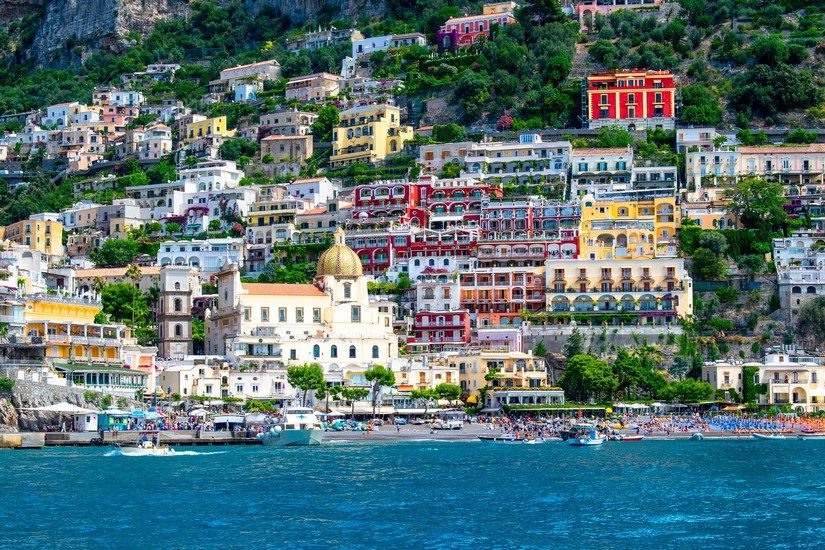 a beautiful view of Positano, one of the most famous places on the Amalfi Coast taken from the water