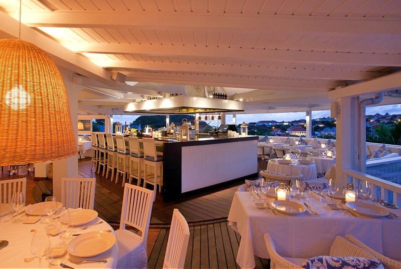 Most St Barthelemy are top notch and Bonito is no exception. Tables classically dressed in white with wicker chairs surround a central bar area. The dining area has a panoramic view of Gustavia and all of it's pleasing architecture.