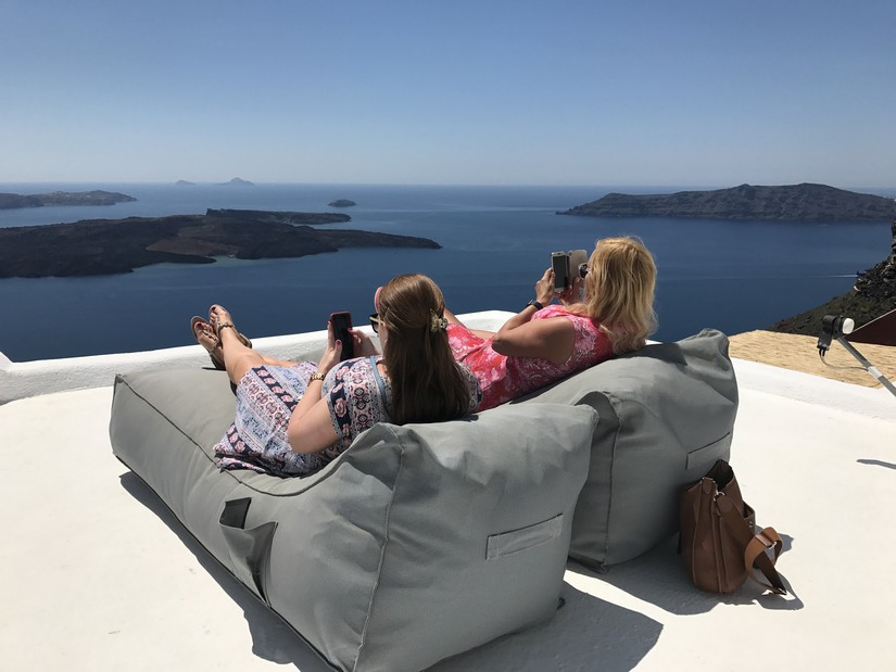 Linda and Alex familiarize themselves with the outrageously comfortable sun-loungers on the sundeck at Villa Gaia. Is this the Best place to stay in Santorini? Quite possibly.