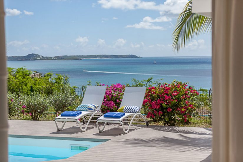 Sun loungers by the pool at Sea Dream