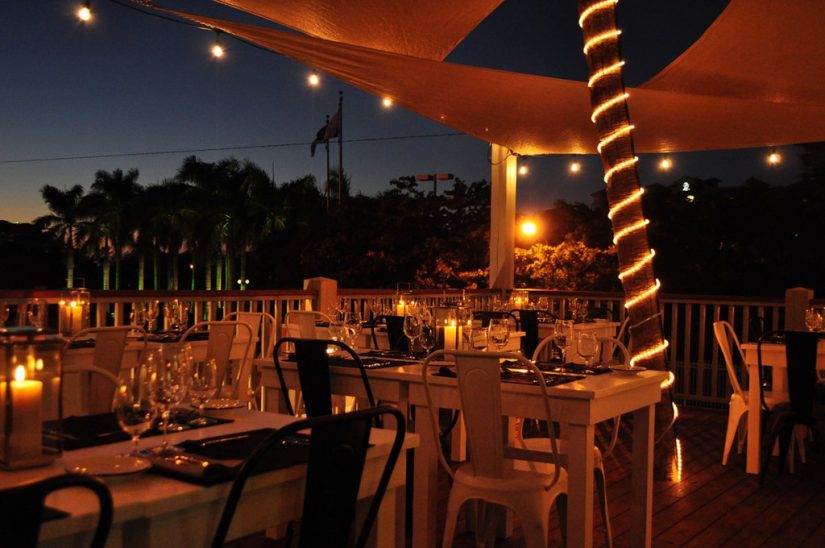 The captivating Via Veneto Restaurant that serves delicious Turks and Caicos food. The tables sit comfortably under the glistening lights above.