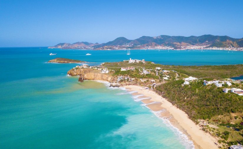 Walk along the pinkish sandy shore and let the water lap lazily onto your toes here on Baie Rouge. A Drone View of Baie Rouge Beach - One of the best beaches in the Caribbean