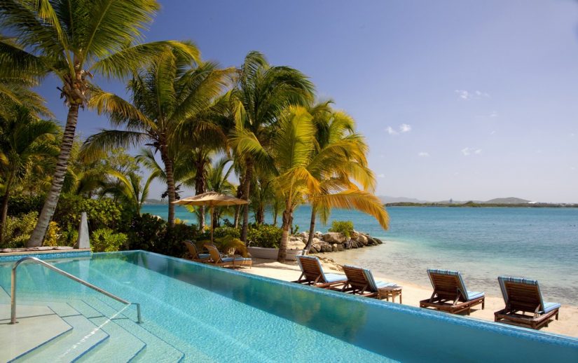 Jumby Bay Beach is laced with luxury villas and resorts Jumby Bay Beach in Antigua is a top Caribbean Beach with white sandy shores and turquoise waters.