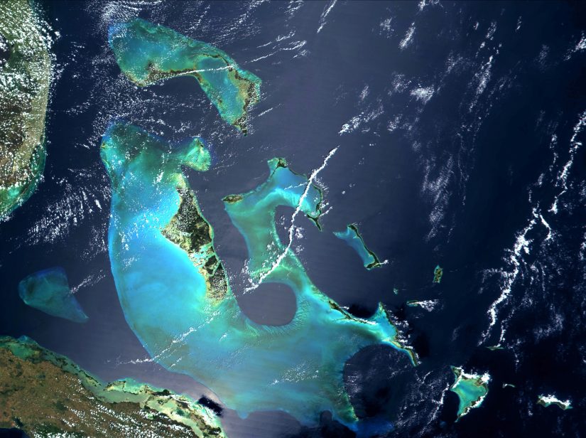 A satellite view of the incredible Bahamas as they are perched on the waters of the Caribbean sea Things to do in the Bahamas include the glorious views across the Sea