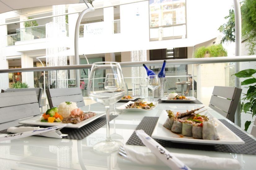A table full of delicious sushi awaits at Lemongrass