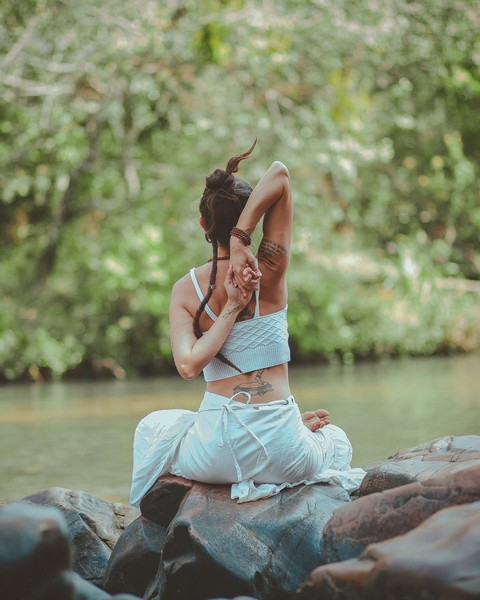 Breathe in this Caribbean way of life with some relaxing half moon yoga 