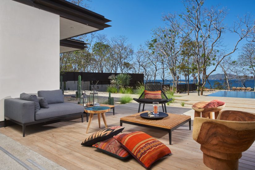 The outdoor sitting area at Morazeba luxury villa in Costa Rica is stylish, comfortable, and placed in the middle of a huge amount of scenic grandeur