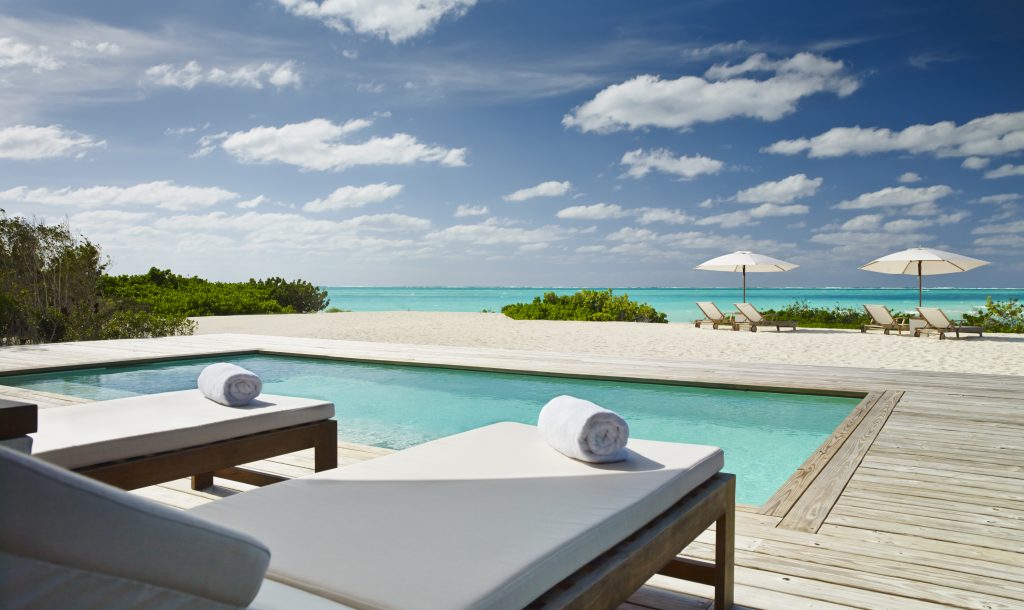 Parrot Cay Turks and Caicos is an exquisite and private beachfront Resort, perfect for your next Caribbean Vacation.