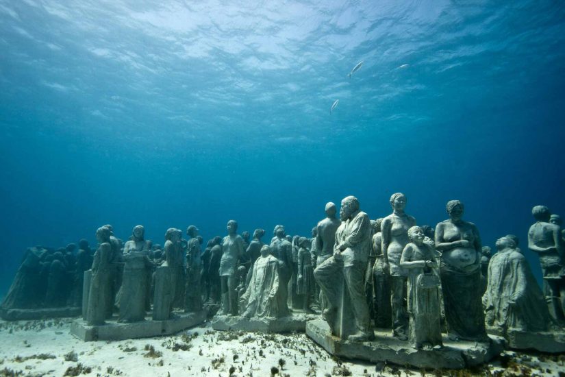 Delve into the crystal-clear turquoise waters and experience this peaceful underwater museum One of the best vacation spots in mexico is Cancun for its captivating underwater Museum experience