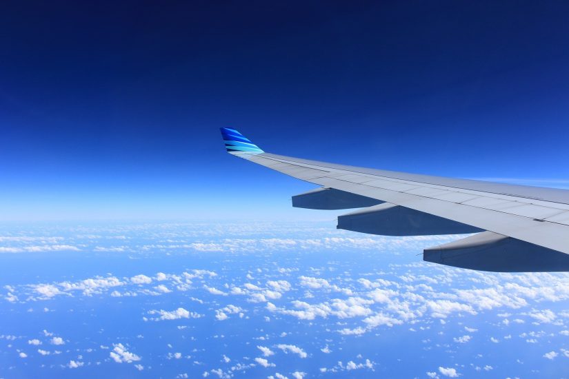 View across the wing of an aeroplane flying direct to the Caribbean from NYC