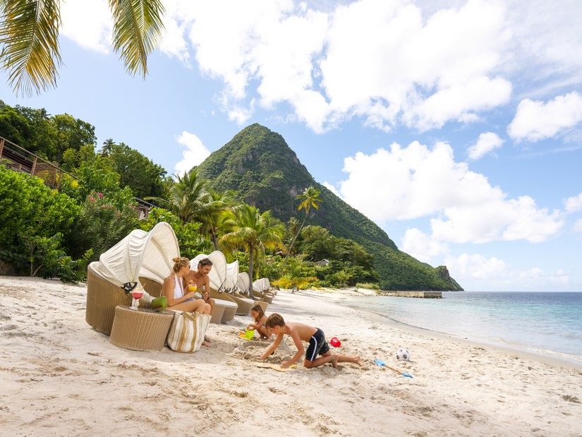 Kids playing on the beach at Sugar Beach Resort in St Lucia