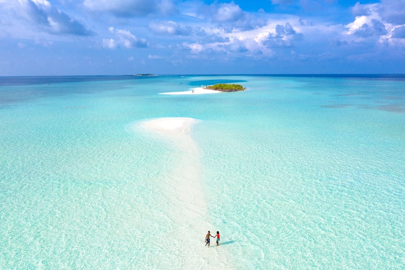 couple walking on a beach