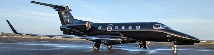 black luxury jet on runway
