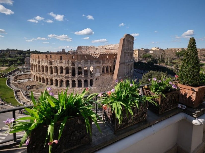 View of the Colosseum from The Great beauty iconic penthouse in Italy