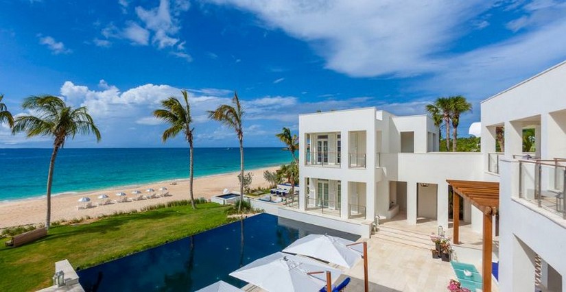 The pool and beach at Cerulean villa in Aguilla