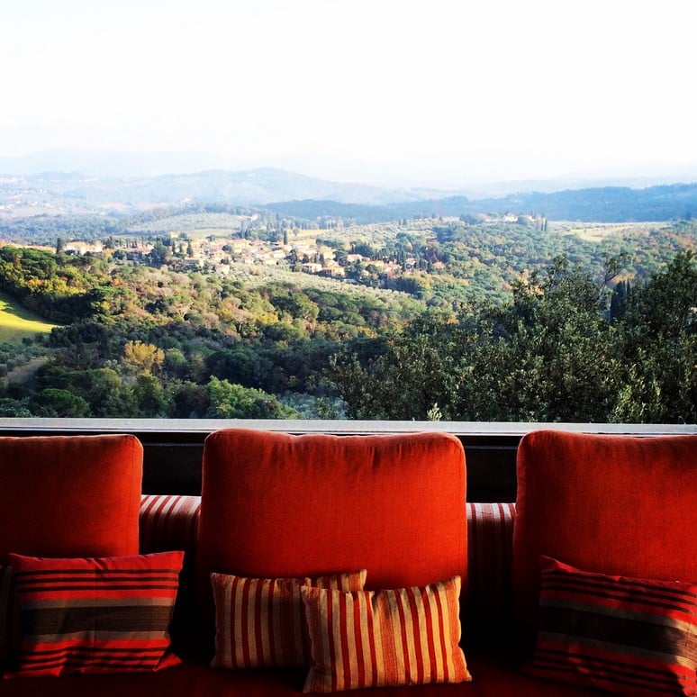 View of the green Florentine hillside from the balcony at Villa Leila