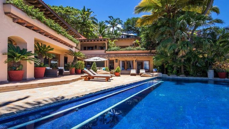 The pool area and sun loungers at Casa Velas in Puerto Vallarta