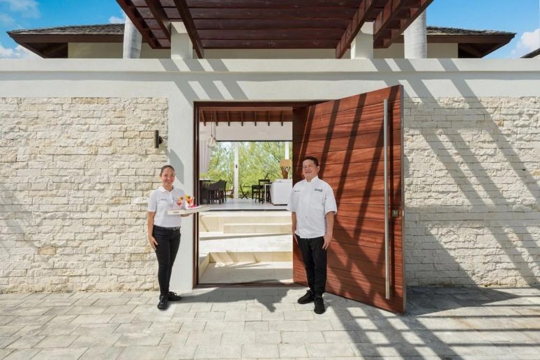 Butler waiting for guests at Azimuth villa in Turks