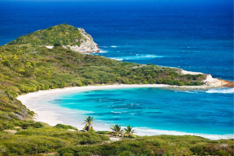 An aerial view of Half Moon Bay in Antigua