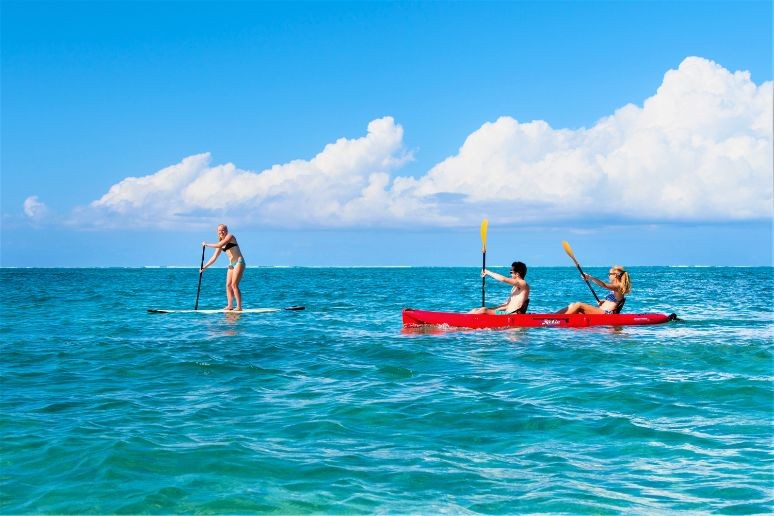 Paddle boarding at beach enclave turks and caicos