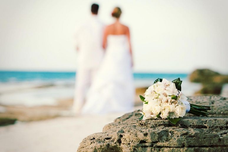 A couple getting married on grace bay beach