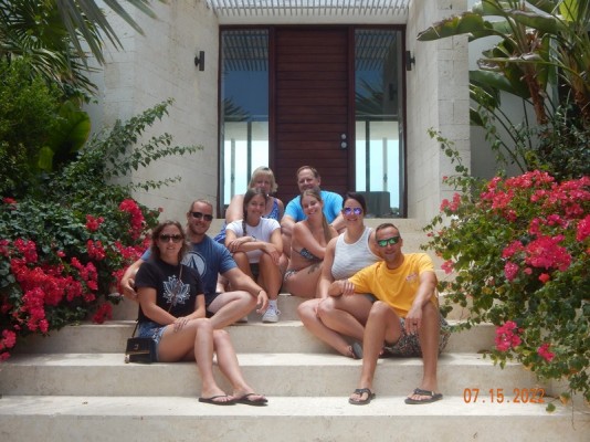 Julie Garilli on the steps at Aguaribay villa in Turks and Caicos