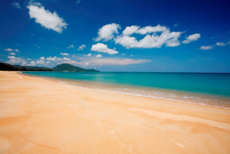 Golden sands and deep blue waters at Phang Nga Bay