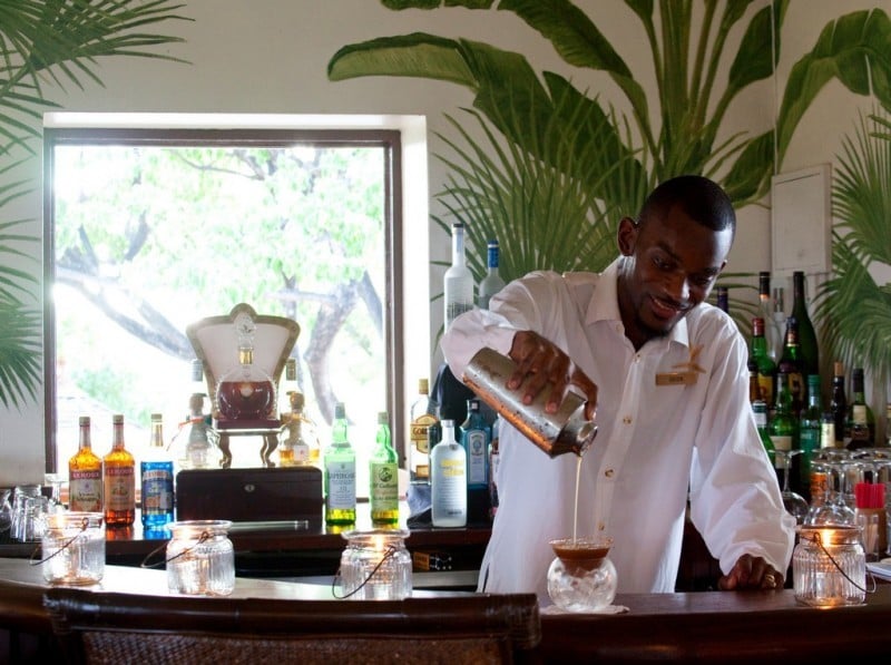 Some kind of Delicious cocktail being created at Jumby Bay by the friendly staff
