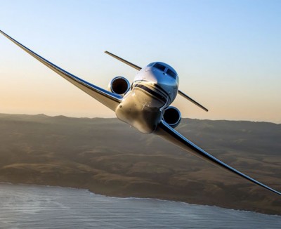 Gulfstream G650 Heavy Jet banks majestically over a tropical landscape