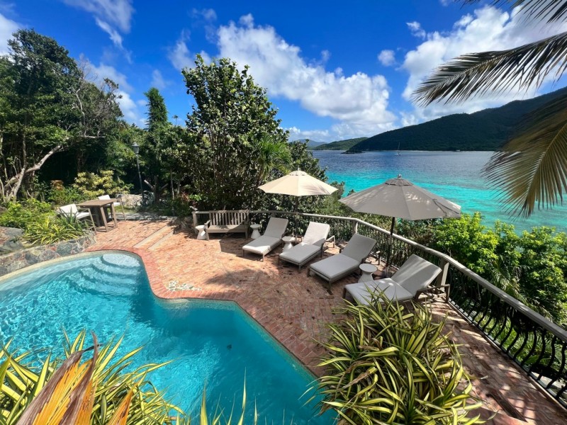 pool with sea in the background