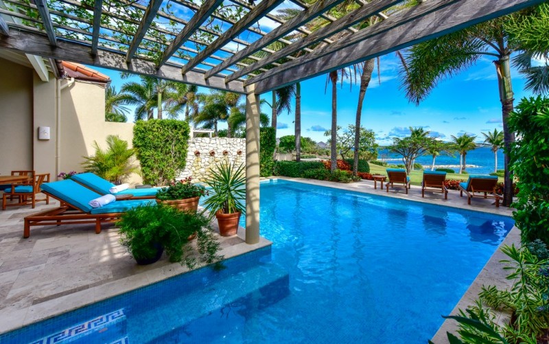 pool with sea in the background