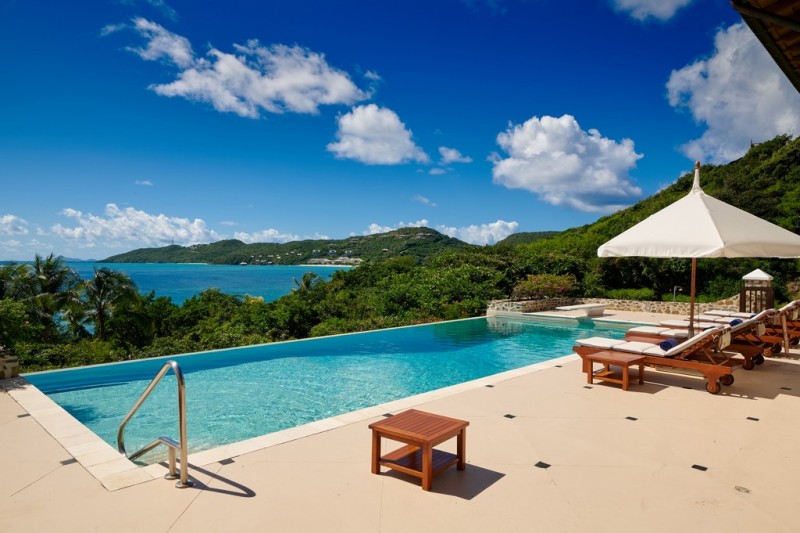 View of the pool terrace at Big Blue Ocean Villa, Canouan