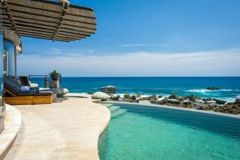 Pool, pool area and a sea and beach view