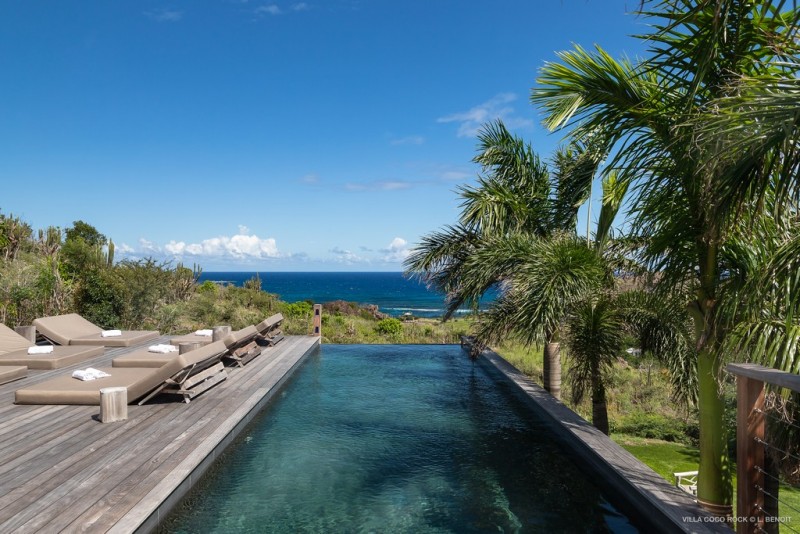 Pool deck, sun loungers and view from Coco Rock