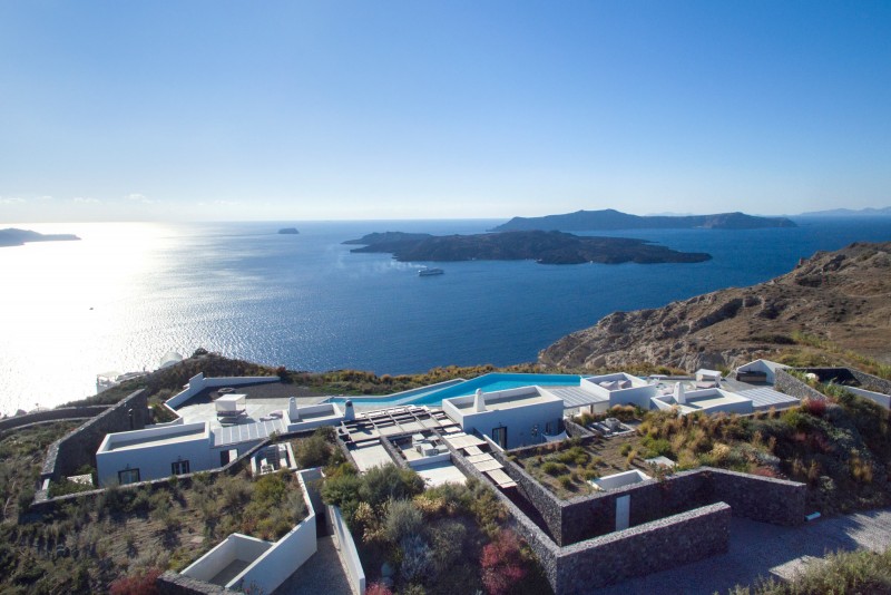 view of villa with sea in the background