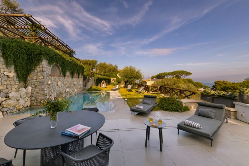 View of the pool terrace and garden at Grandalba, Sorrento