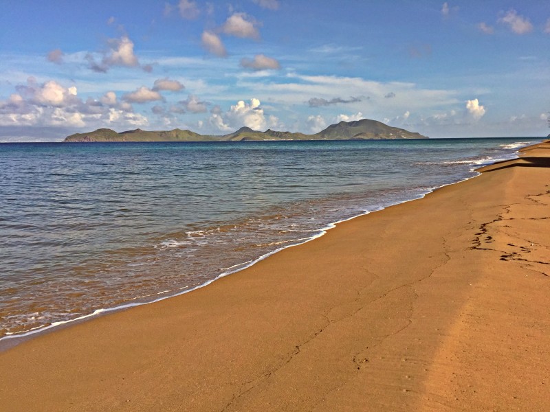 View of the sandy beach at the Hamilton Beach Resort in Nevi