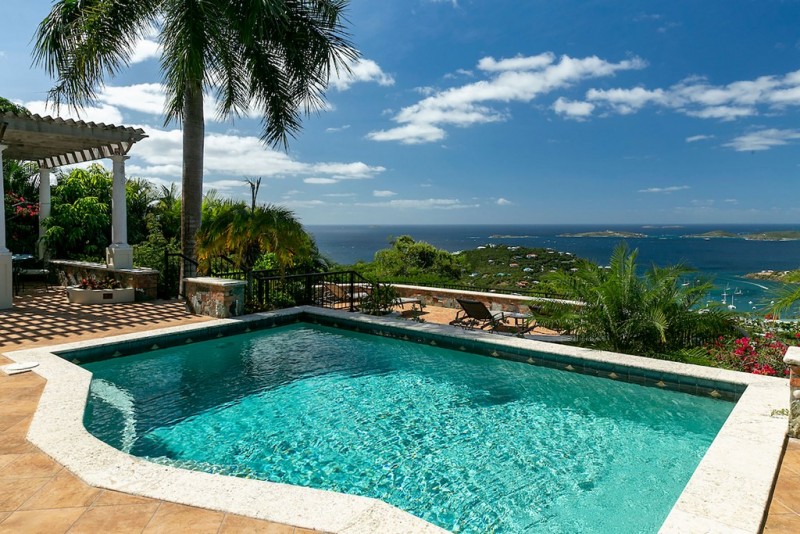 View of villa's turquoise pool and spectacular views