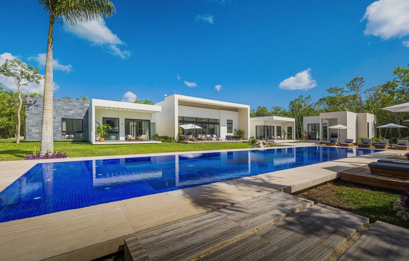 pool and villa view of L'and at Mariposa in Cozumel
