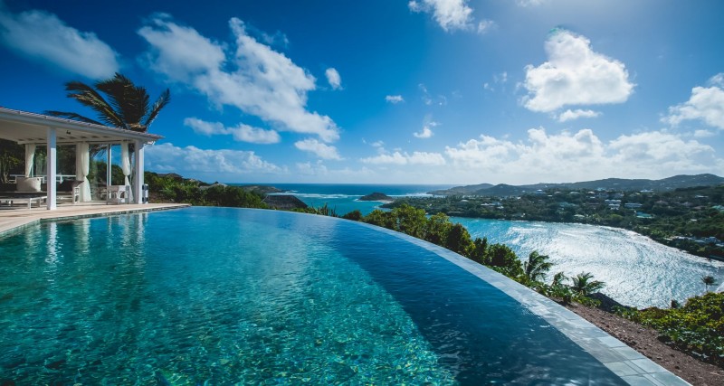 pool with sea in the background
