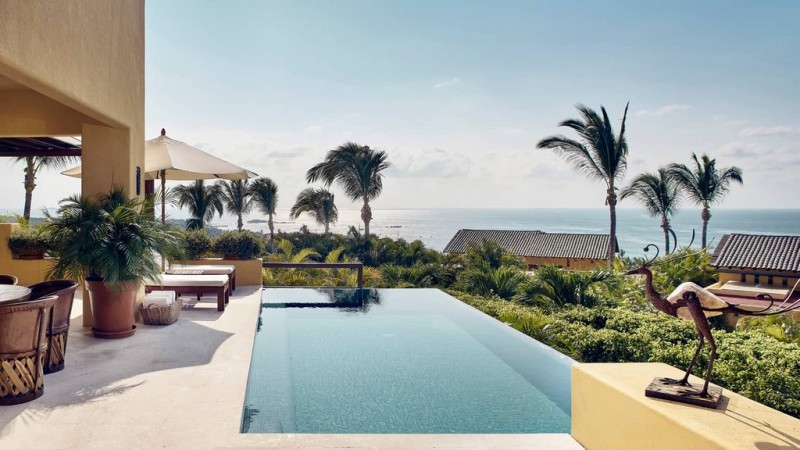 View of the infinity pool and outdoor pool area overlooking 